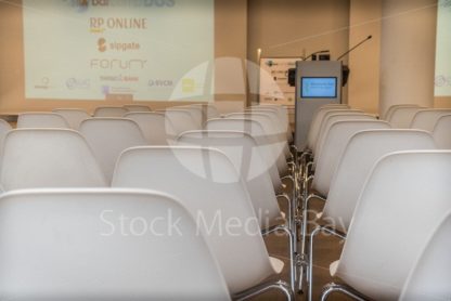 white chairs in conference room