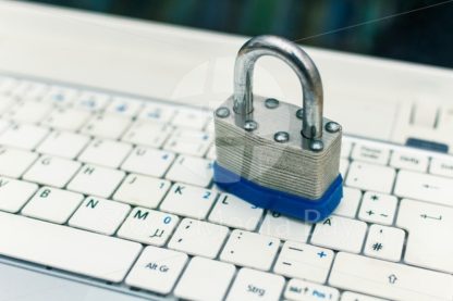 Security Lock on Computer Keybaord - Stock Media Bay