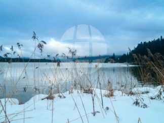 Winter Scenery – Snow Lake cloudy sky  Bavaria Germany - Stock Media Bay